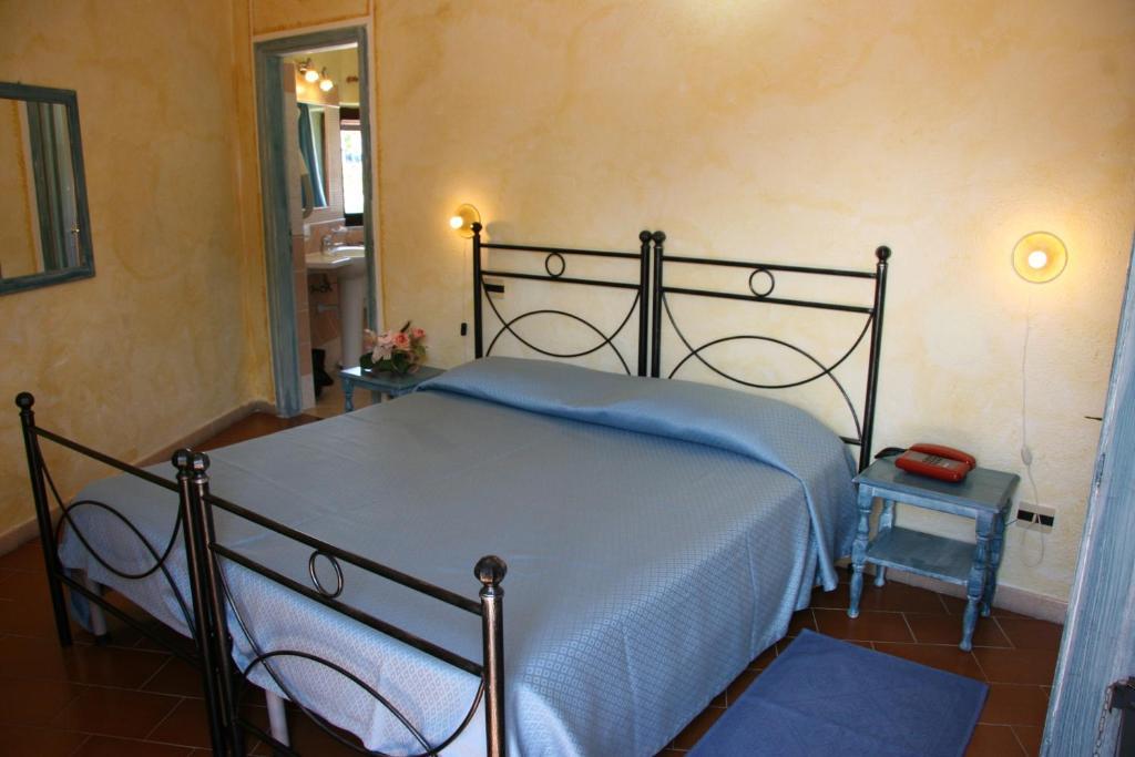 Hotel Le Dune Porto Pollo Habitación foto